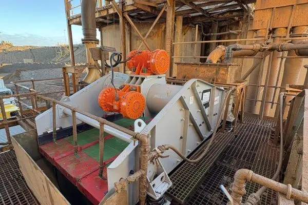 Vibrating screen with new drive motors on a mine site